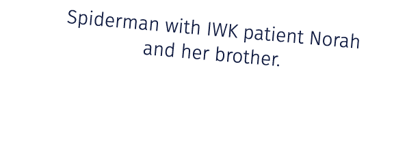 Spiderman with IWK patient Norah and her brother. 
