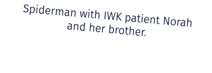 Spiderman with IWK patient Norah and her brother. 