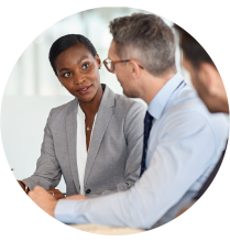 A women and a man in discussion in a professional setting.