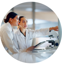 Two women, medical researchers, in discussion