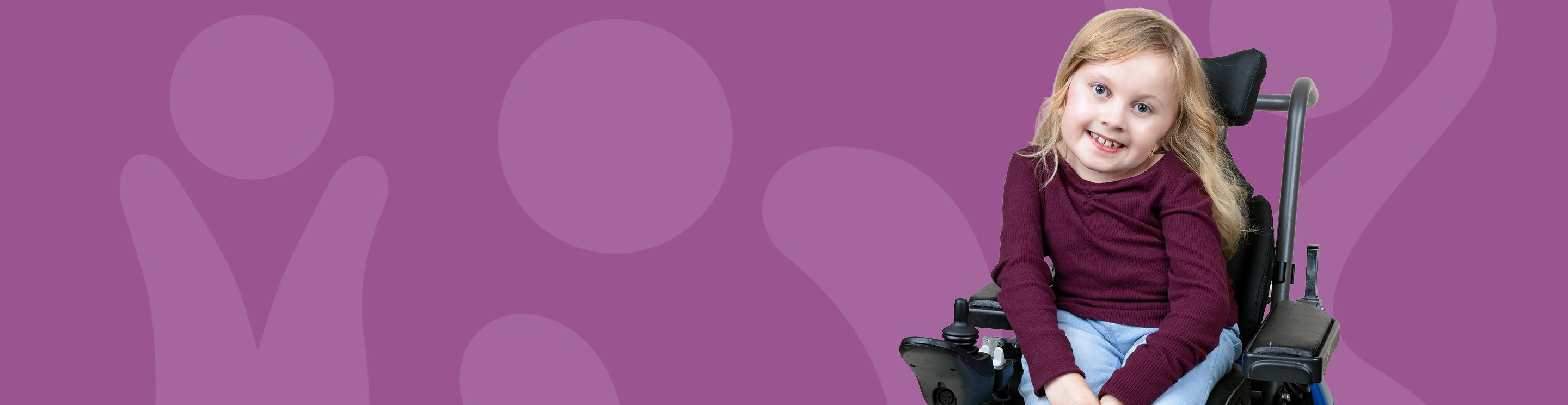 Champion Child Ellis smiling at the camera.