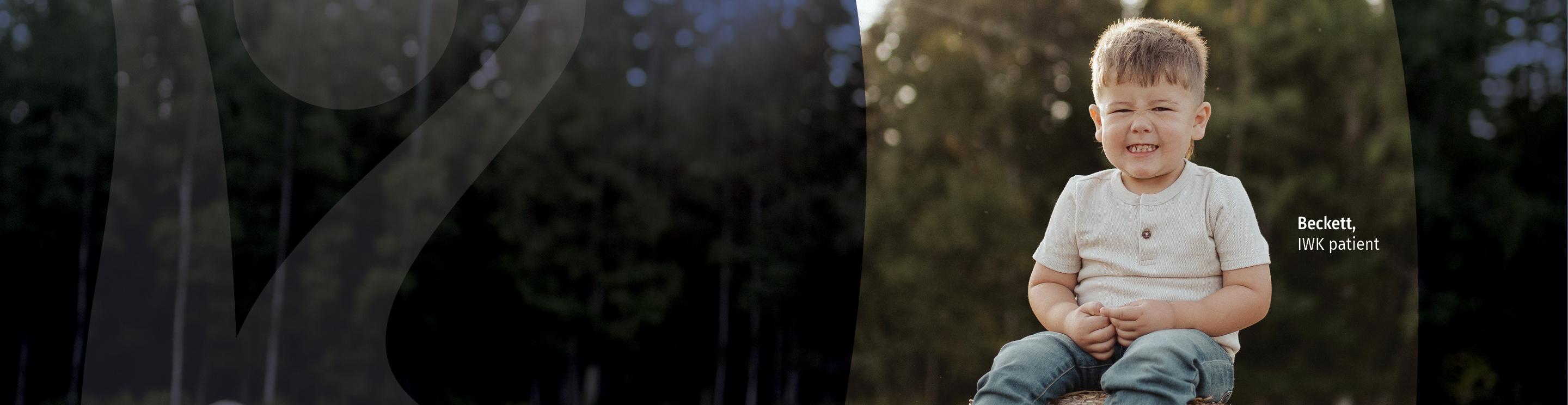Beckett sitting outdoors in a wooded setting, smiling with his eyes closed and hands clasped in front of him. Text reads “Beckett, IWK patient.”