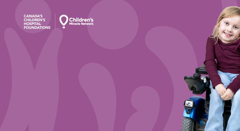 Ellis smiling at the camera.