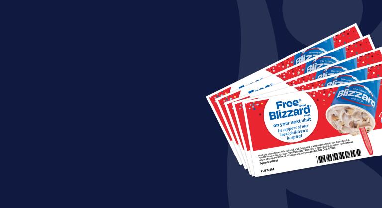 Dairy Queen Blizzard Treat fundraising coupons fanned out on a dark blue background.