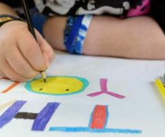 Closeup of a child colouring